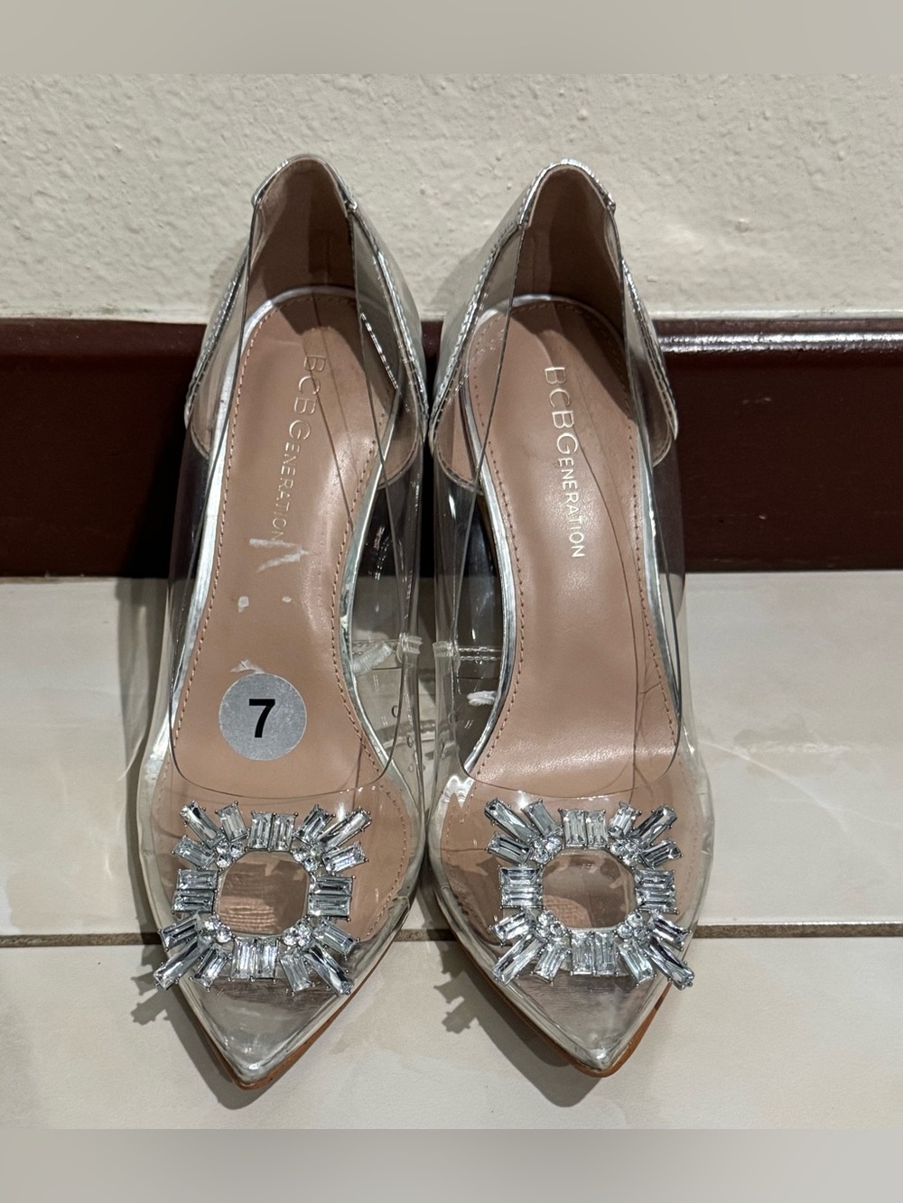 BCBGeneration Clear PVC Pointed Toe Pumps with Silver Crystal Brooch